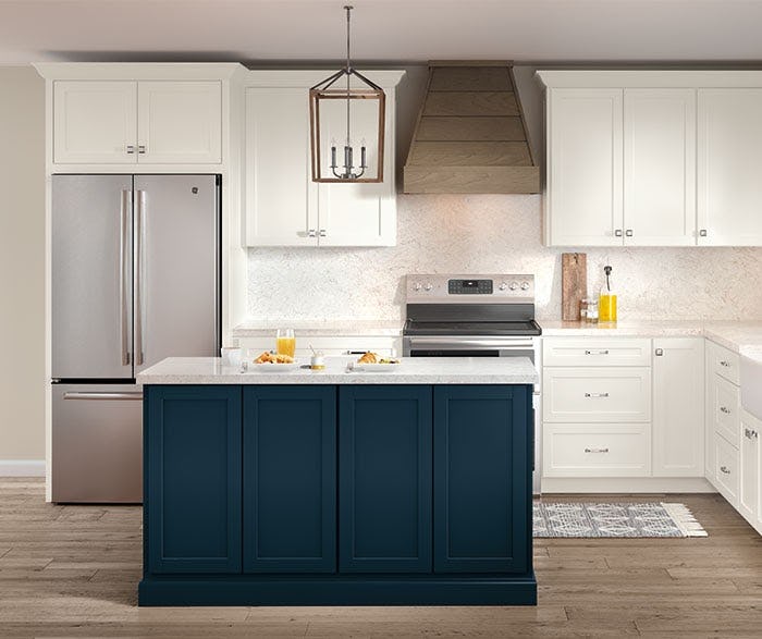 Trendy blue cabinets add a pop of color in the kitchen